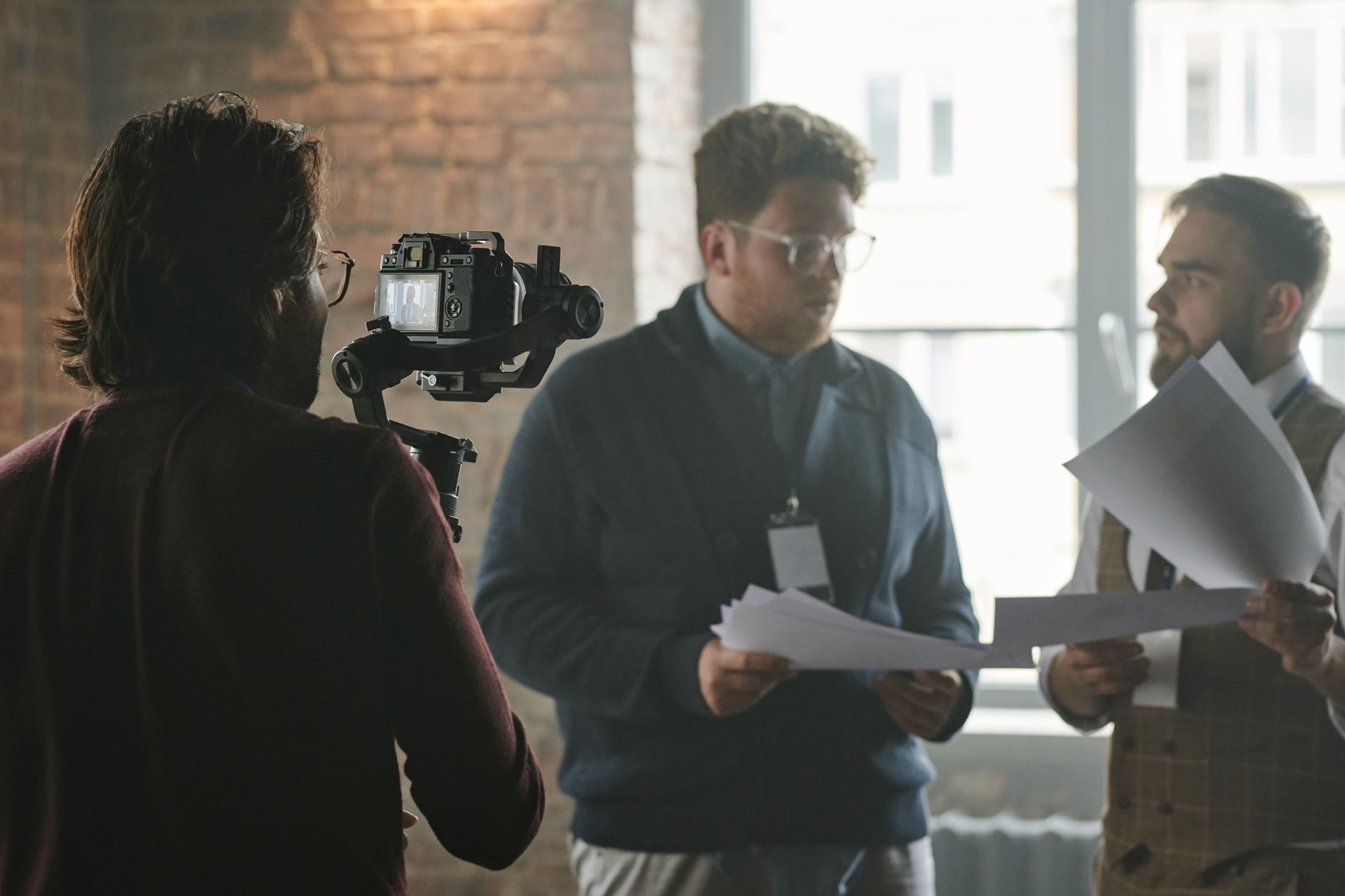 Horizon video production crew behind the camera filming a corporate film